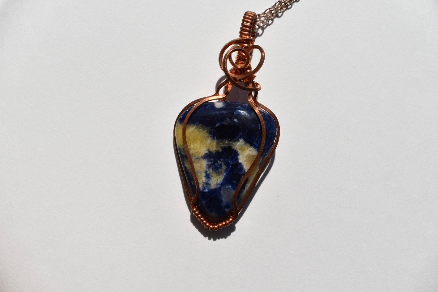 Sodalite Wrapped in Copper Wire Pendant