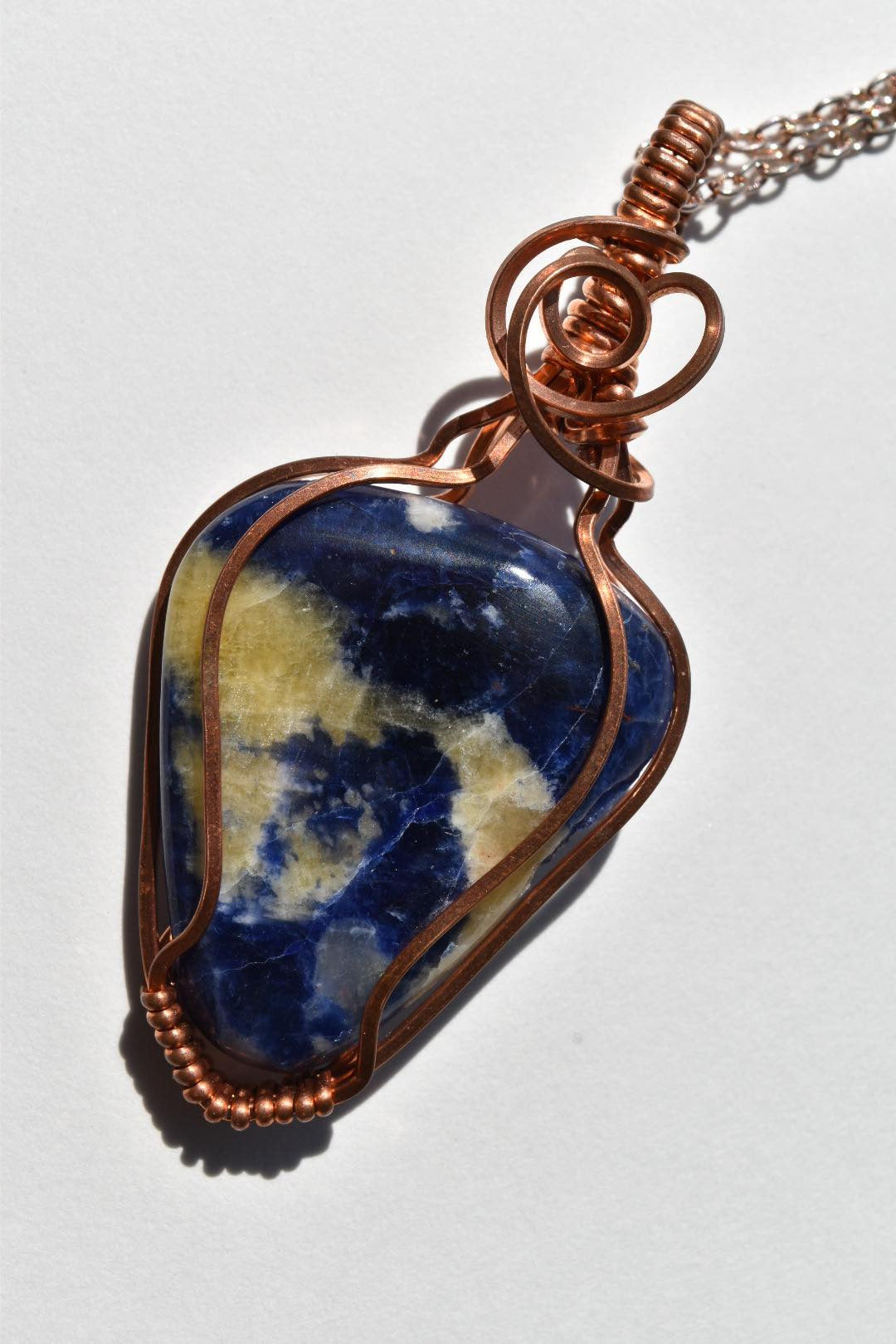 Sodalite Wrapped in Copper Wire Pendant